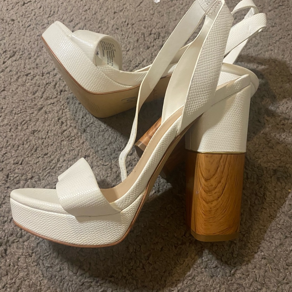 Fun strappy sandals. Never worn.